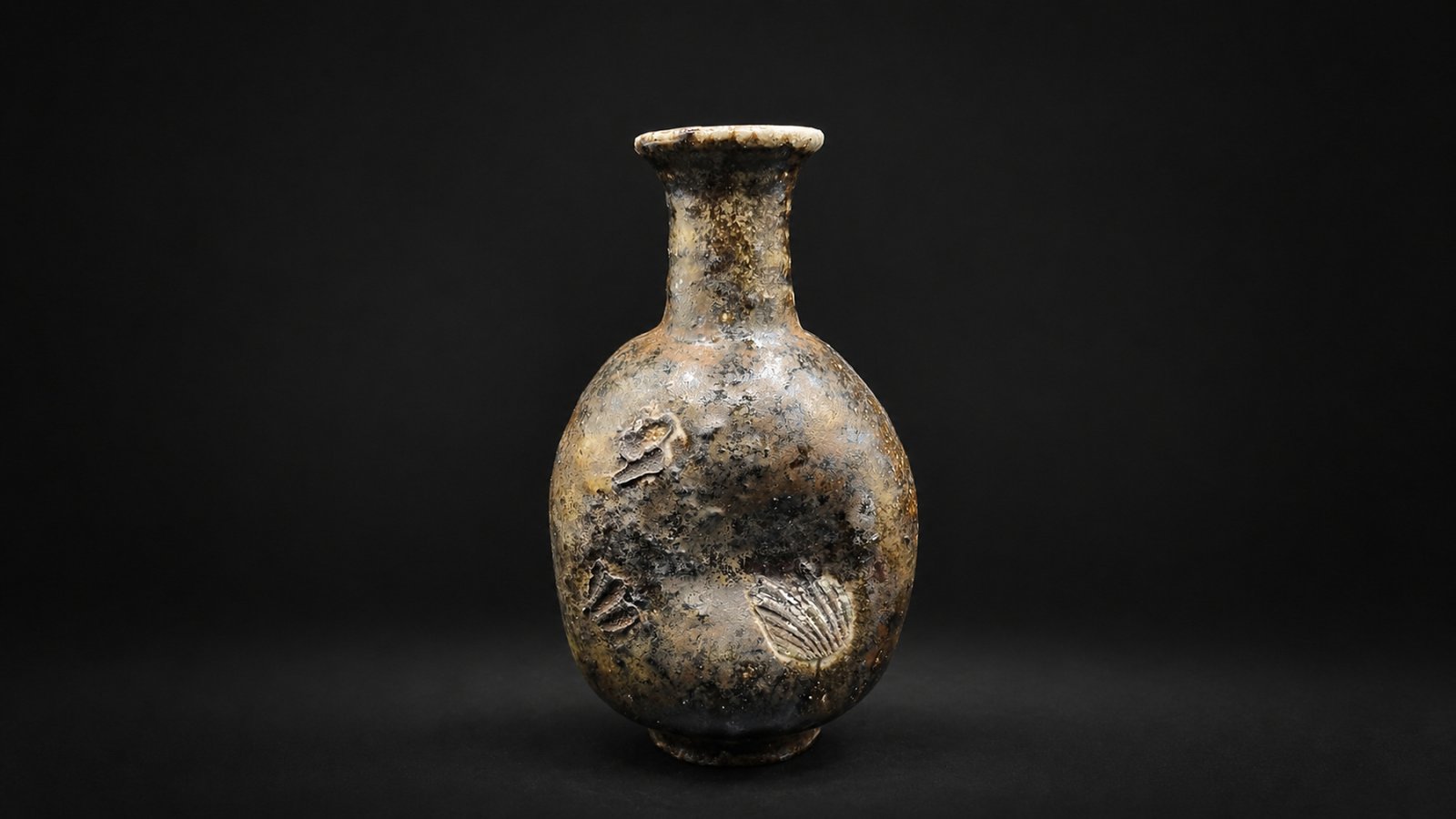 Weathered Shell-Impressed Bottle